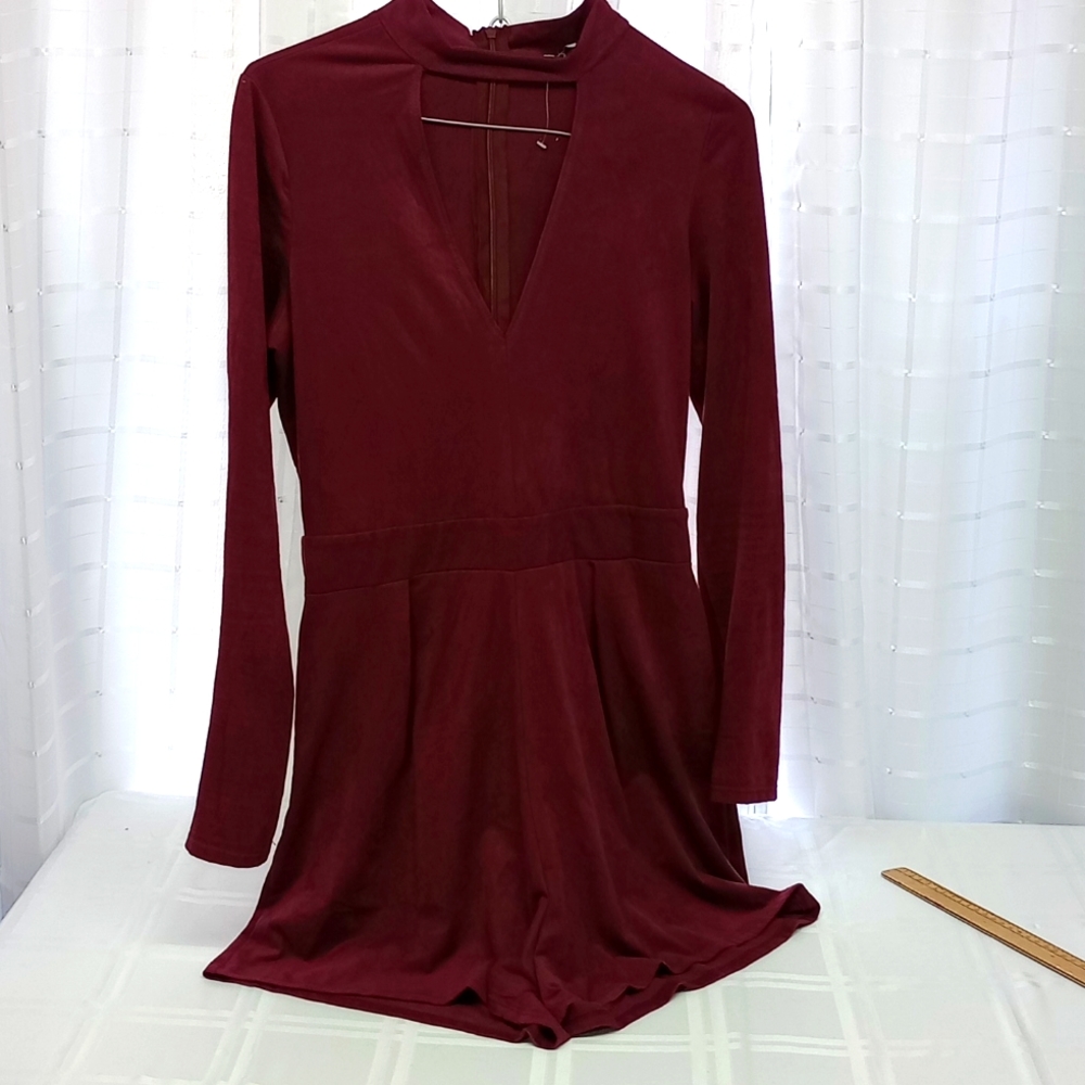Cute burgundy velvet type fabric skirt/scorts, sized M but more like a small